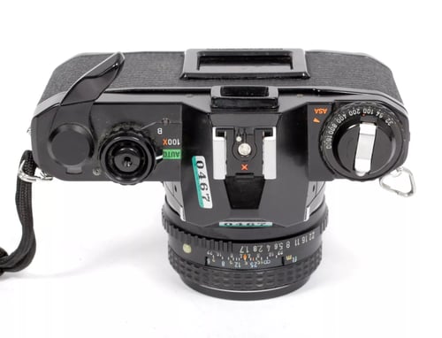 Image of Pentax MV1 35mm SLR Film Camera with 50mm F1.7 SMC lens #0467
