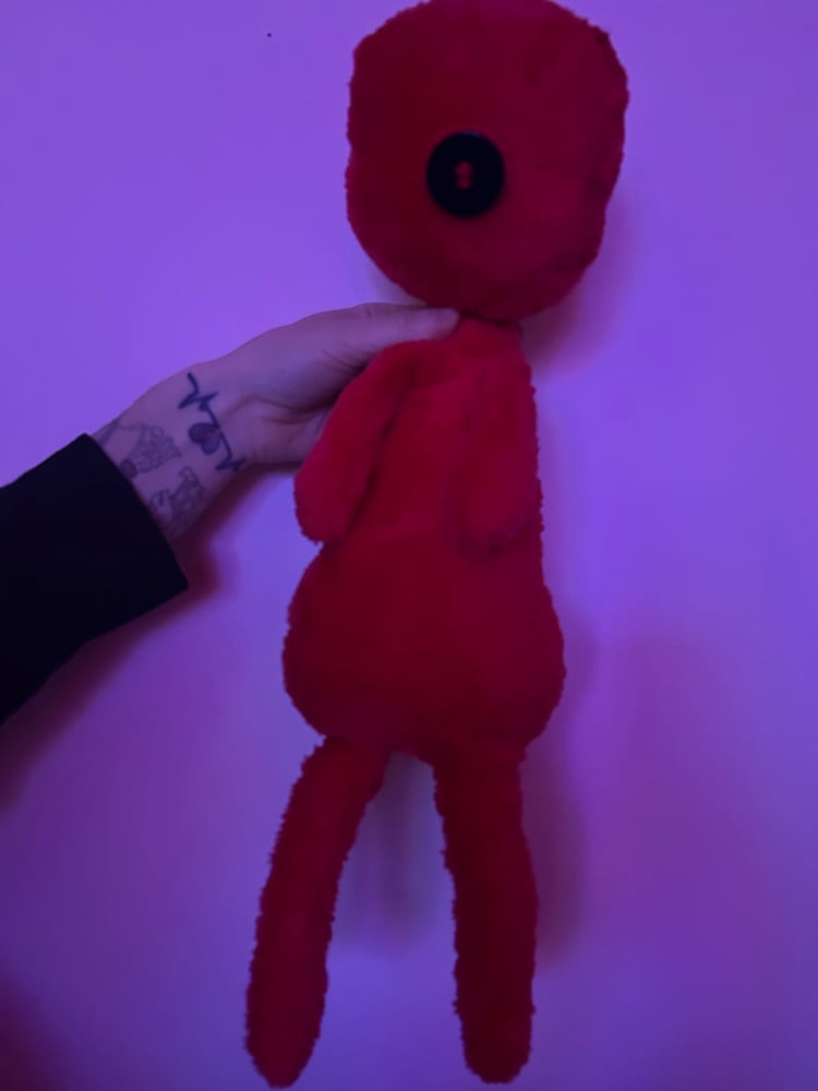 Image of Button eye gibbie