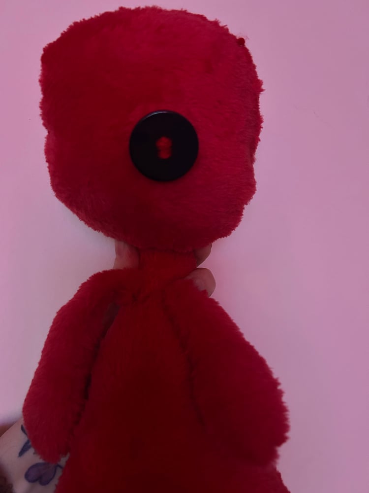 Image of Button eye gibbie