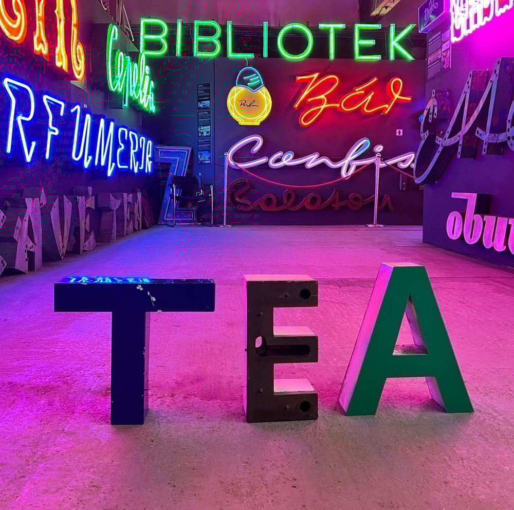 Image of Mixed Letters 'TEA' sign