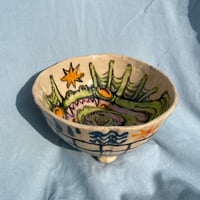 Image 2 of dragon eating dragon eating dragon...bowl