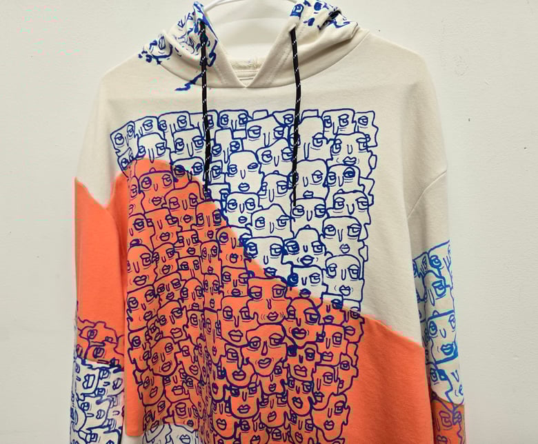 Image of Size Large Faces Hoodie Orange and White 1 of 1