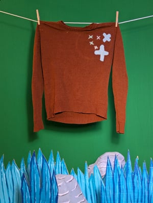 Image of Burnt Orange acrylic sweater (small) with felted and quilted patches