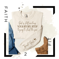 Image 1 of God is still writing YOUR STORY Sweatshirt