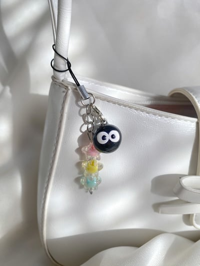 Image of soot sprite charm