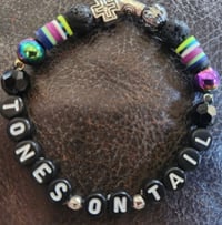 TONES ON TAIL BAND NAME BRACELET 