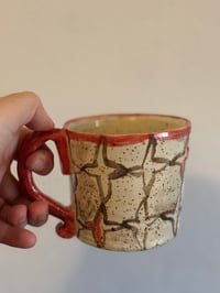 Image 4 of Taza roja y negra