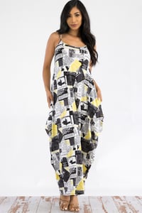 Image 1 of Spaghetti strap black and yellow newspaper dress