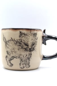 Image 3 of kitty woke up and craves chaos ☕️