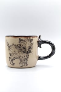 Image 1 of kitty woke up and craves chaos ☕️