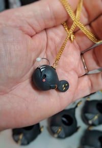 Image 1 of Baby Blagness Porcelain Pendant 
