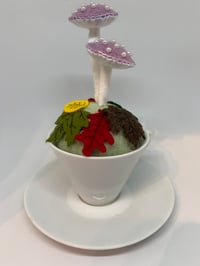 Pincushion with pink mushrooms
