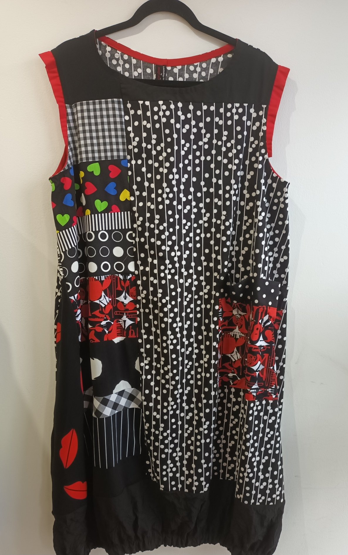 Image of black and white, touch of red dress