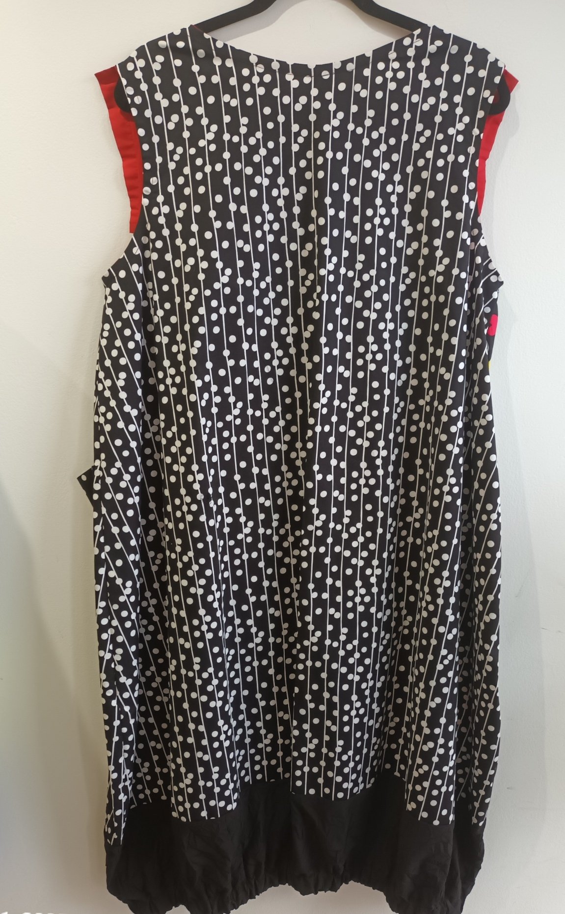 Image of black and white, touch of red dress