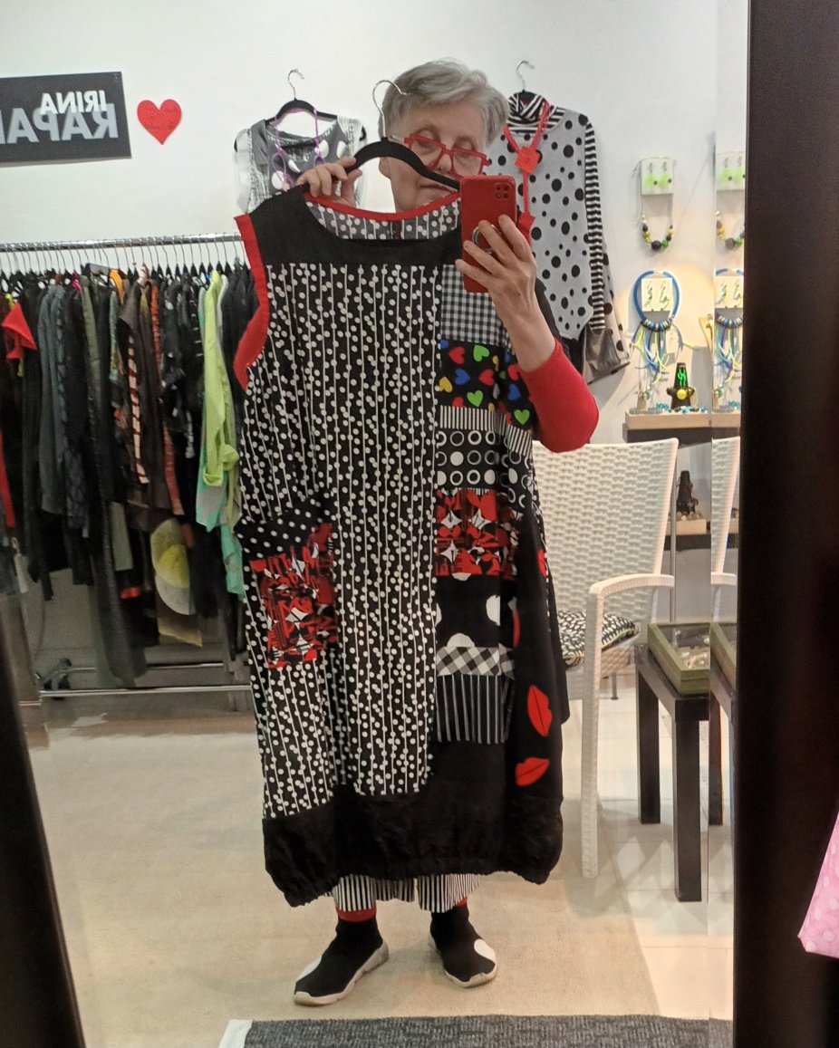 Image of black and white, touch of red dress