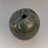 Oribe thrown and altered moon jar