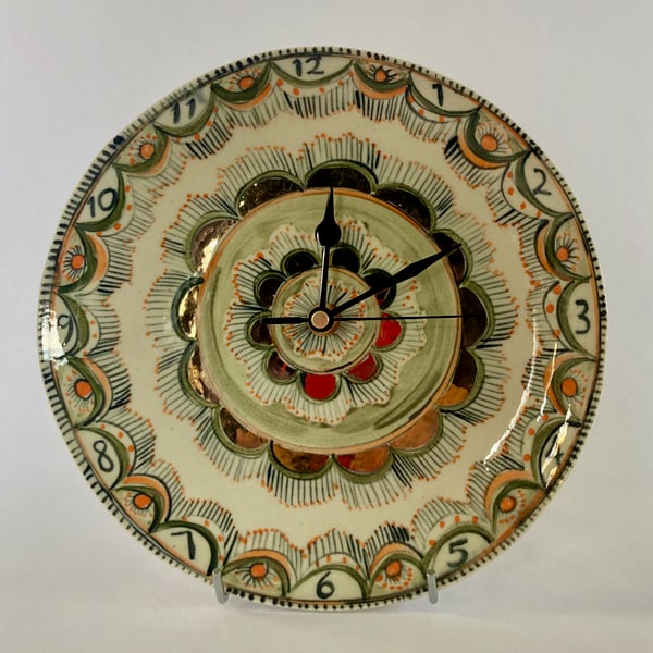 Image of Orange and gold clock