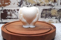Image 1 of Holding Heart Candle