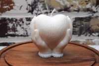 Image 2 of Holding Heart Candle