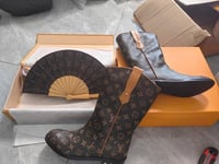 Image 2 of LV Boots on the Ground 
