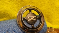 Image 2 of Pillar vent emblem - New OEM - set of Left/Right