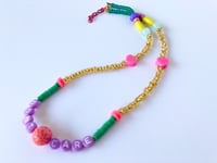 Image 2 of Don't Care alphabet beaded necklace