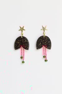 Image 1 of Dangly glittery black flowers with pistils earrings