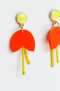 Image 2 of Dangly orange flowers with pistils earrings