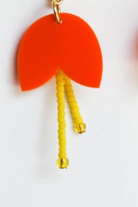 Image 3 of Dangly orange flowers with pistils earrings