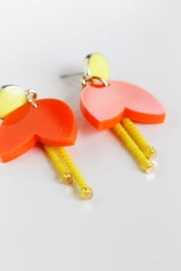 Image 4 of Dangly orange flowers with pistils earrings