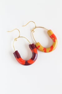 Image 4 of Mismatched clay oval earrings