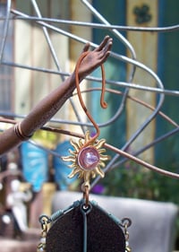 Image 5 of "Beloved Son of God" earrings or ornaments with stained glass windows and lots of jewels.