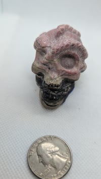 Image 1 of Rhodonite crystal skull