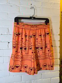 Image 1 of Orange Chill Alien Faces Basketball Shorts