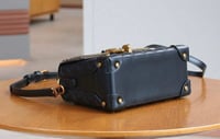 Image 3 of Fashionable woman’s 2025 handbag.