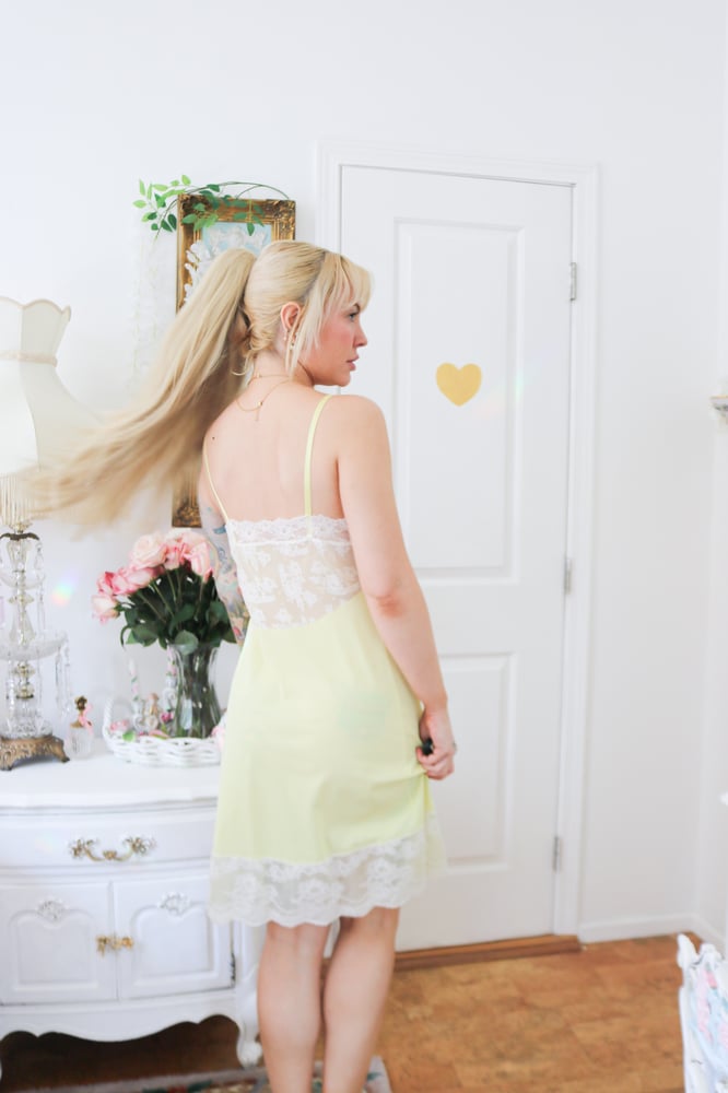 Image of Vintage 1950s/60s Pastel Yellow Springtime Sunshine Slip (Small)