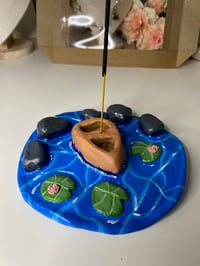 Image 1 of Canoe boat and waterlillies clay incense holder