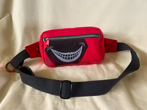 Image of Bright Red fanny pack with Grinning patch