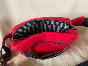 Image of Bright Red fanny pack with Grinning patch