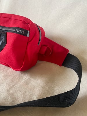 Image of Bright Red fanny pack with Grinning patch