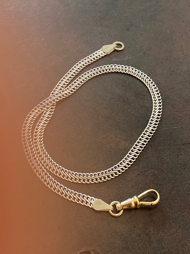 REFLECTING IN THE MORNING, SHINING BY NIGHT

Our Silver Wrap-Around Bracelet wraps elegantly two times around the wrist.
The fluid open structure chain is luminous yet lightweight and made for living in.

Whether you prefer the cool shine of silver, the warm glow of gold it can all be found in this piece. 
The 22mm musqueton clasp (and connections parts) which functions as a ornament is available as a solid sterling 925 silver or solid 18K gold part.

Wondrous in sentiment, ...