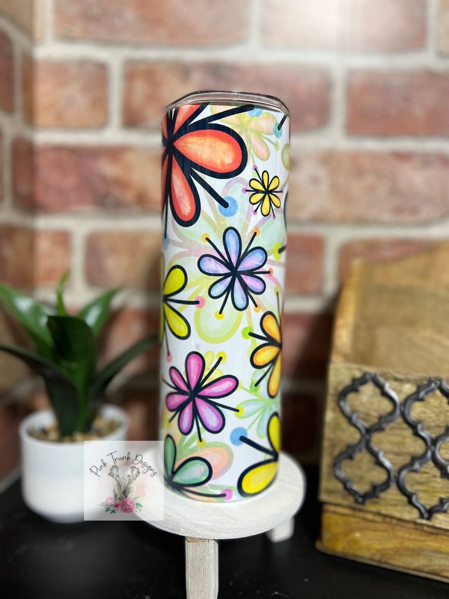 https://assets.bigcartel.com/product_images/402d7327-5f41-41ff-9a5a-16989b39317a/groovy-flower-tumbler.jpg?auto=format&fit=max&h=1200&w=1200