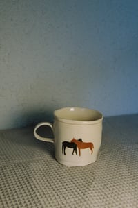 Taza caballos