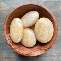 Image 1 of Mango Calcite Palm Stone, Orange Calcite, Crystal Palm stone, For Motivation, Joy & Empowerment