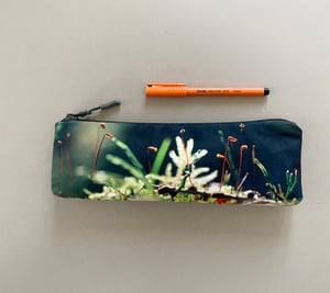 Image of Tree mosses, long travel bag, pens, brushes zipper pouch