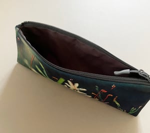 Image of Tree mosses, long travel bag, pens, brushes zipper pouch