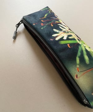 Image of Tree mosses, long travel bag, pens, brushes zipper pouch