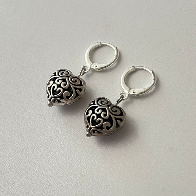 metal puffy heart silver huggie hoop earrings