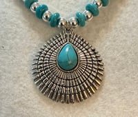 Image 3 of Howlite turquoise necklace with silver tone spacers and  silver tone pendant.