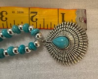 Image 4 of Howlite turquoise necklace with silver tone spacers and  silver tone pendant.